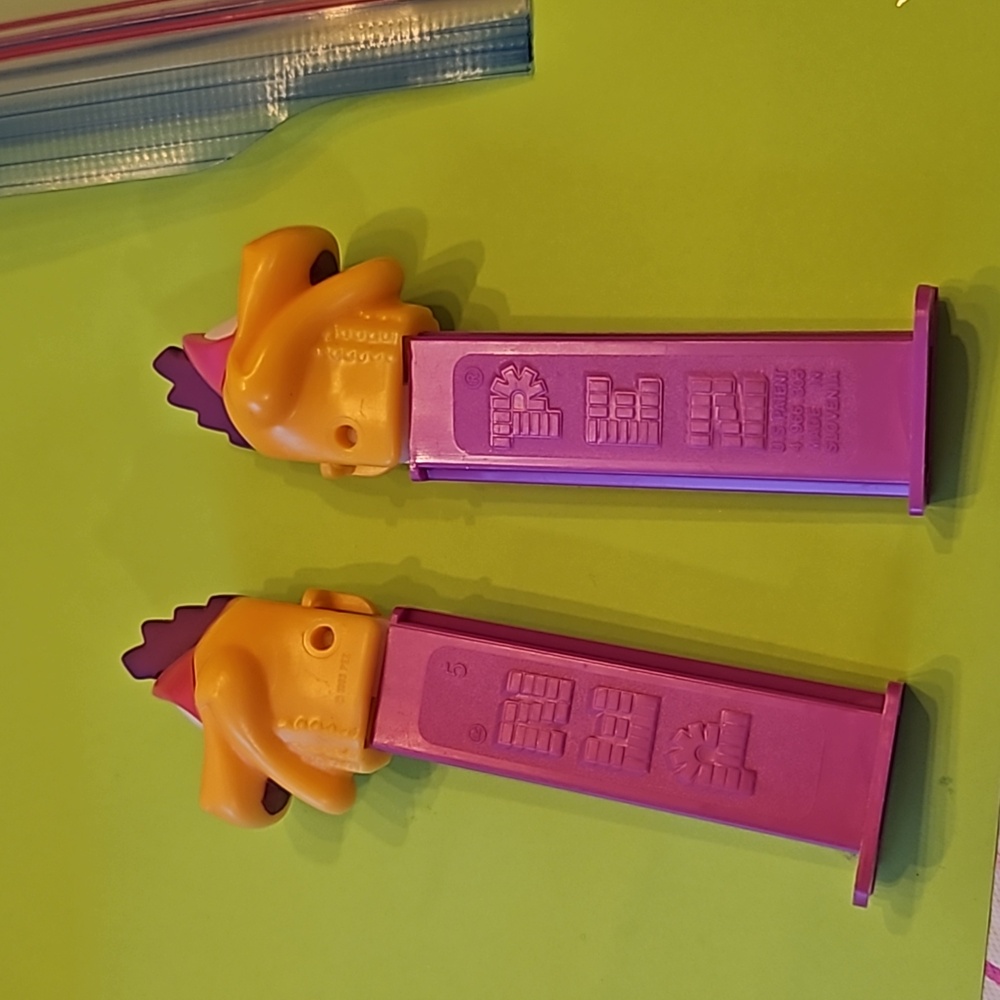 Set of 2 Pez-a-saur / he-saur.